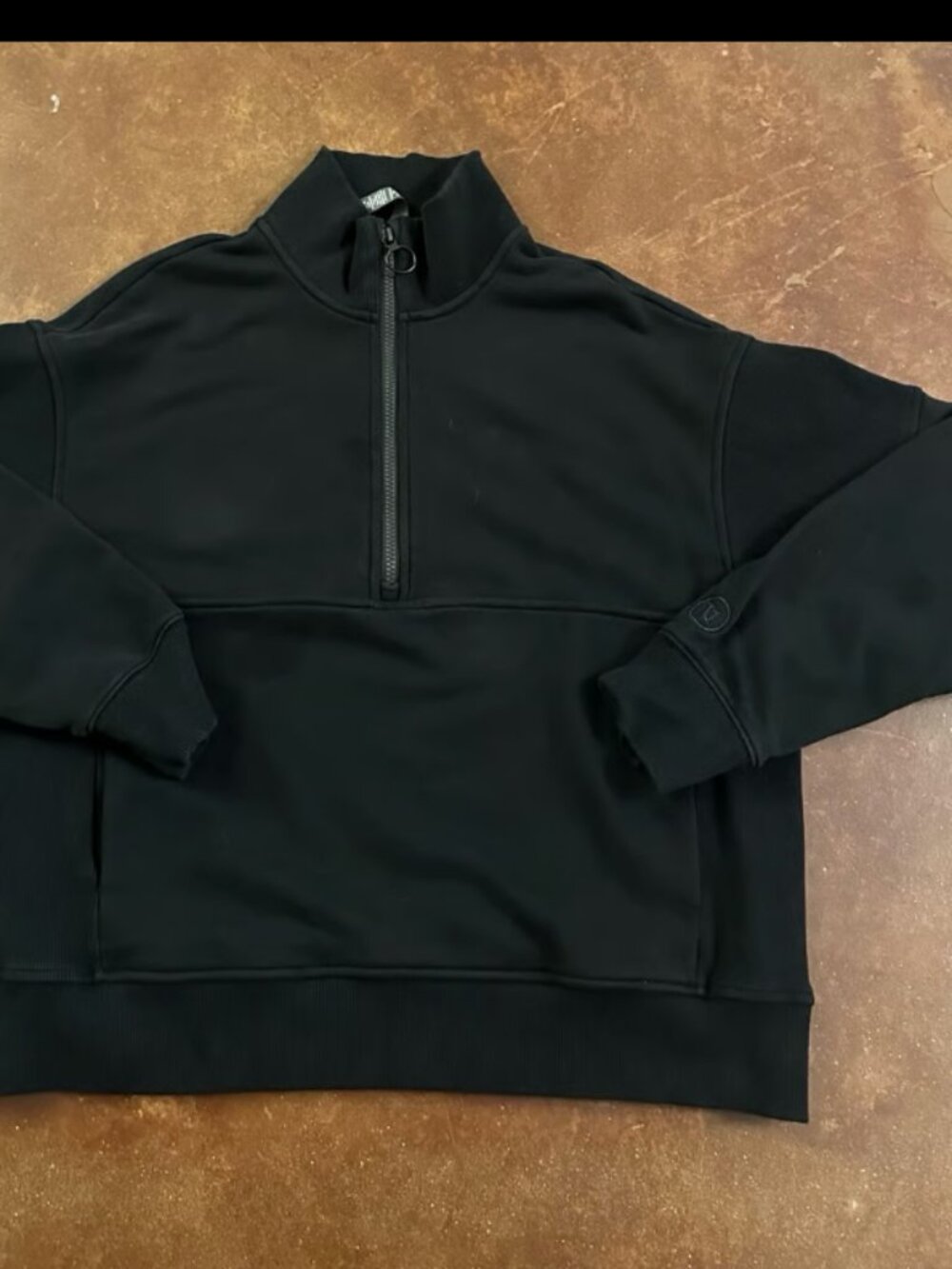 Vuori Women's Sedona Rib Half Zip athletic pullover sweatshirt.